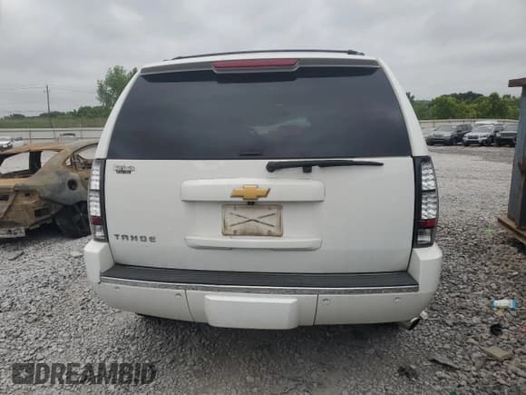 ✅ 2014 Chevrolet Tahoe LTZ • VIN: 1GNSCCE04ER134403 • Лот: 58833755. Опубликован ранее на Copart с пробегом 121 799 миль. Бесплатный доступ к архиву аукционных продаж из США и подробный отчёт об истории автомобиля на DreamBid. Изображение 6.