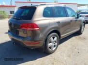 ✅ 2012 Volkswagen Touareg Lux • VIN: WVGEF9BP6CD008938 • Лот: 43243609. Опубликован ранее на IAAI с пробегом 199 470 миль. Бесплатный доступ к архиву аукционных продаж из США и подробный отчёт об истории автомобиля на DreamBid. Изображение 4.
