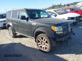 ✅ 2011 Dodge Nitro Heat • VIN: 1D4PU4GK3BW573902 • Lot: 43630383. Listed on IAAI with 100,515 mi. Free auction sales archive from the USA and detailed vehicle history report at DreamBid. Image 1.
