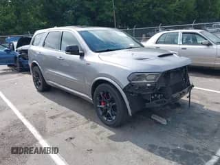 2021 Dodge Durango R/T with VIN 1C4SDJCT6MC879260, listed as a IAAI auction lot 42709837 with 59,646 mi miles and . Bid and sale history available at DreamBid. Image 1.