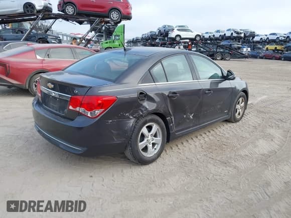 ✅ 2014 Chevrolet Cruze 1LT • VIN: 1G1PC5SB5E7140456 • Lot: 43527056. Listed on IAAI with 45,788 mi. Free auction sales archive from the USA and detailed vehicle history report at DreamBid. Image 4.