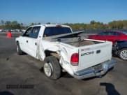 ✅ 2001 Dodge Dakota Sport • VIN: 1B7GL2AN81S127838 • Lot: 40687174. Wystawiony na IAAI z przebiegiem 235 301 mil. Bezpłatny archiwum sprzedaży aukcyjnych z USA i szczegółowy raport historii pojazdu na DreamBid. Zdjęcie 3.