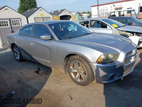 ✅ 2014 Dodge Charger RT • VIN: 2C3CDXCT9EH171742 • Lot: 43012411. Listed on IAAI with 256,632 mi. Free auction sales archive from the USA and detailed vehicle history report at DreamBid. Image 13.