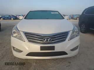 2012 Hyundai Azera z VIN KMHFG4JG0CA134798, wystawiony jako Copart lot #77982914 z przebiegiem Nie podano mil oraz Szkoda całkowita • Salvage title. Historia ofert i sprzedaży dostępna na DreamBid. Obrazek 5.