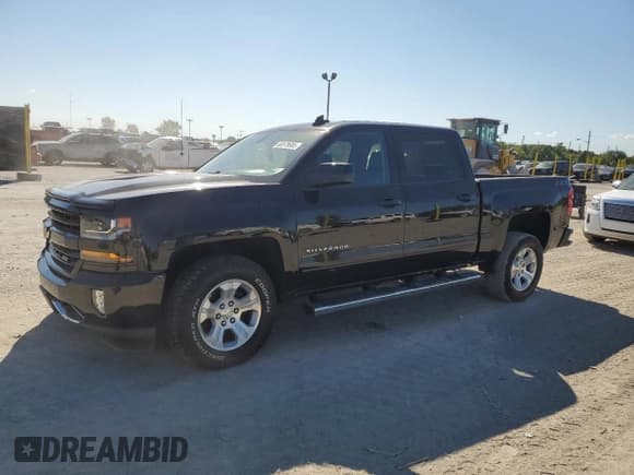 ✅ 2018 Chevrolet Silverado 1500 LT • VIN: 3GCUKREC9JG319915 • Лот: 69978685. Опубликован ранее на Copart с пробегом 155 717 миль. Бесплатный доступ к архиву аукционных продаж из США и подробный отчёт об истории автомобиля на DreamBid. Изображение 1.