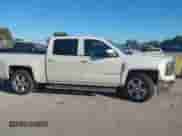 2015 Chevrolet Silverado 1500 LT z VIN 3GCPCREC6FG332798, wystawiony jako IAAI lot #43461490 z przebiegiem 57 078 mil mil oraz . Historia ofert i sprzedaży dostępna na DreamBid. Obrazek 13.