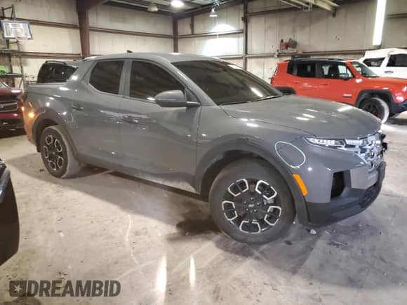 2022 Hyundai Santa Cruz SEL с VIN 5NTJB4AEXNH005539, выставлен на аукционе Copart как лот 85541234 с пробегом 30 954 миль миль и Списание • Salvage title. История ставок и продаж доступна на DreamBid. Изображение 4.