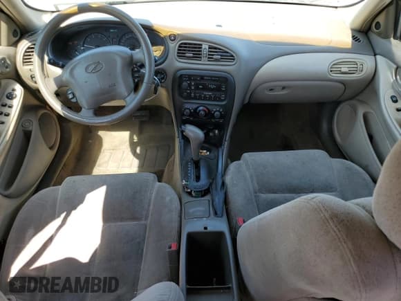 ✅ 1999 Oldsmobile Alero GL • VIN: 1G3NL52E8XC303961 • Lot: 65962434. Wystawiony na Copart z przebiegiem 160 336 mil. Bezpłatny archiwum sprzedaży aukcyjnych z USA i szczegółowy raport historii pojazdu na DreamBid. Zdjęcie 8.