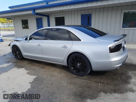 ✅ 2012 Audi A8 • VIN: WAURVAFD7CN018461 • Lot: 93071705. Wystawiony na Copart z przebiegiem 146 036 mil. Bezpłatny archiwum sprzedaży aukcyjnych z USA i szczegółowy raport historii pojazdu na DreamBid. Zdjęcie 2.
