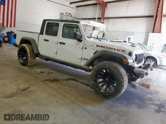 ✅ 2024 Jeep Gladiator Mojave • VIN: 1C6JJTEG1RL131885 • Лот: 85310855. Опубликован ранее на Copart с пробегом Не указан. Бесплатный доступ к архиву аукционных продаж из США и подробный отчёт об истории автомобиля на DreamBid. Изображение 4.