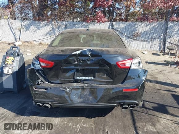 ✅ 2014 Maserati Ghibli S Q4 • VIN: ZAM57RTA9E1106695 • Lot: 40783416. Listed on IAAI with 92,885 mi. Free auction sales archive from the USA and detailed vehicle history report at DreamBid. Image 16.