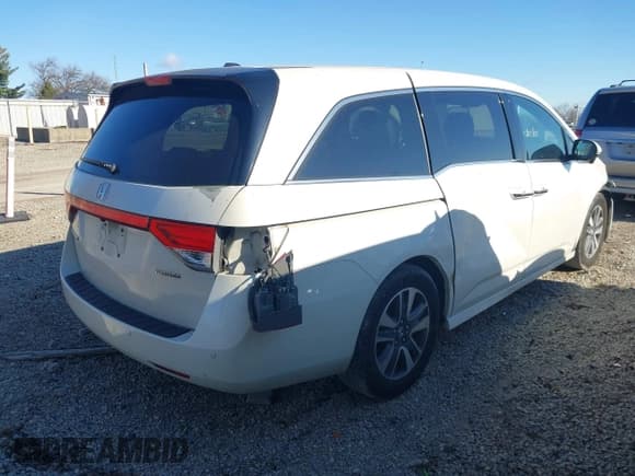 ✅ 2015 Honda Odyssey Touring Elite • VIN: 5FNRL5H99FB074655 • Lot: 43803030. Listed on IAAI with 153,633 mi. Free auction sales archive from the USA and detailed vehicle history report at DreamBid. Image 4.