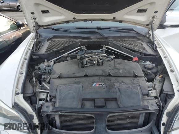 ✅ 2014 BMW X6 M • VIN: 5YMGZ0C53E0J99801 • Lot: 91769675. Wystawiony na Copart z przebiegiem 113 246 mil. Bezpłatny archiwum sprzedaży aukcyjnych z USA i szczegółowy raport historii pojazdu na DreamBid. Zdjęcie 12.