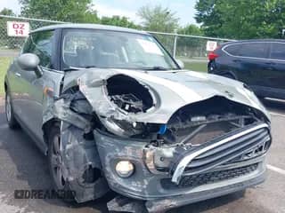 2019 MINI Hardtop Cooper with VIN WMWXP5C53K2H97589, listed as a IAAI auction lot 42617936 with 50,528 mi miles and . Bid and sale history available at DreamBid. Image 1.