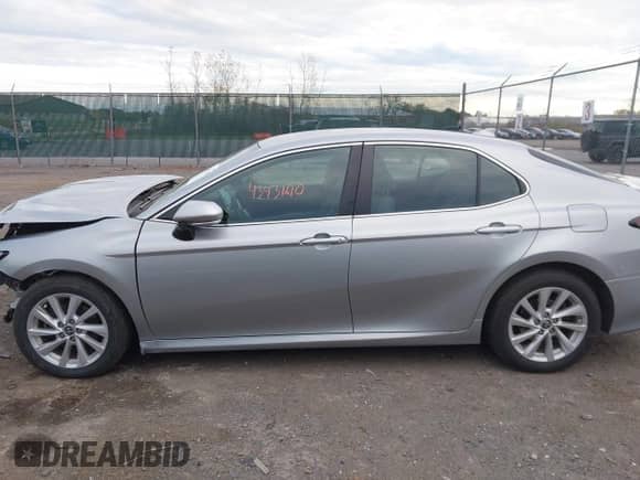 2022 Toyota Camry LE with VIN 4T1R11BK9NU067765, listed as a IAAI auction lot 43431610 with 60,319 mi miles and . Bid and sale history available at DreamBid. Image 14.