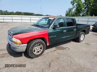 2001 Dodge Dakota Sport с VIN 1B7HL2AN61S284434, выставлен на аукционе Copart как лот 58711665 с пробегом 162 776 миль миль и Списание • Salvage title. История ставок и продаж доступна на DreamBid. Изображение 1.