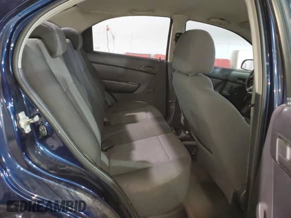 2009 Chevrolet Aveo z VIN 3G1TV55E29L125011, wystawiony jako Copart lot #43053005 z przebiegiem 133 559 mil mil oraz Czysty tytuł • Clean title. Historia ofert i sprzedaży dostępna na DreamBid. Obrazek 10.