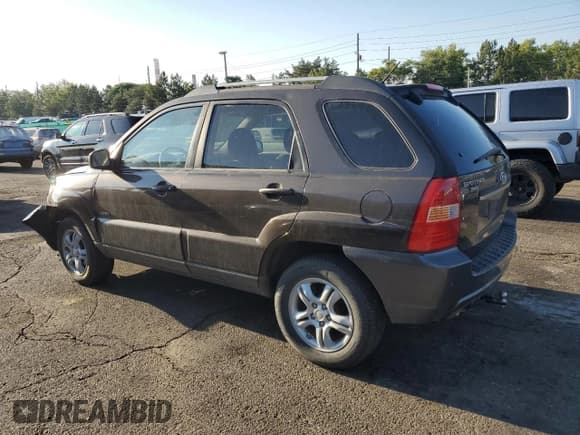 ✅ 2007 Kia Sportage EX • VIN: KNDJE723477311325 • Лот: 68219425. Опубликован ранее на Copart с пробегом 241 397 миль. Бесплатный доступ к архиву аукционных продаж из США и подробный отчёт об истории автомобиля на DreamBid. Изображение 2.