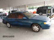 ✅ 1998 Toyota Corolla LE • VIN: 2T1BR18E9WC016104 • Lot: 43838320. Listed on IAAI with 110,096 mi. Free auction sales archive from the USA and detailed vehicle history report at DreamBid. Image 13.