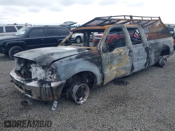 ✅ 2002 Ford F-350 XL • VIN: 1FTSW31F52EA93146 • Lot: 42292422. Listed on IAAI with Not provided. Free auction sales archive from the USA and detailed vehicle history report at DreamBid. Image 2.