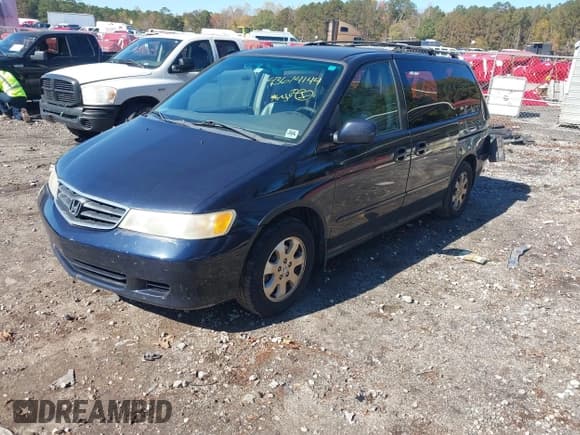 ✅ 2004 Honda Odyssey EX-L • VIN: 5FNRL18914B041364 • Lot: 43614144. Listed on IAAI with 245,584 mi. Free auction sales archive from the USA and detailed vehicle history report at DreamBid. Image 2.