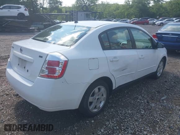 ✅ 2009 Nissan Sentra FE+ • VIN: 3N1AB61E39L695802 • Лот: 42764479. Опубликован ранее на IAAI с пробегом 108 816 миль. Бесплатный доступ к архиву аукционных продаж из США и подробный отчёт об истории автомобиля на DreamBid. Изображение 4.