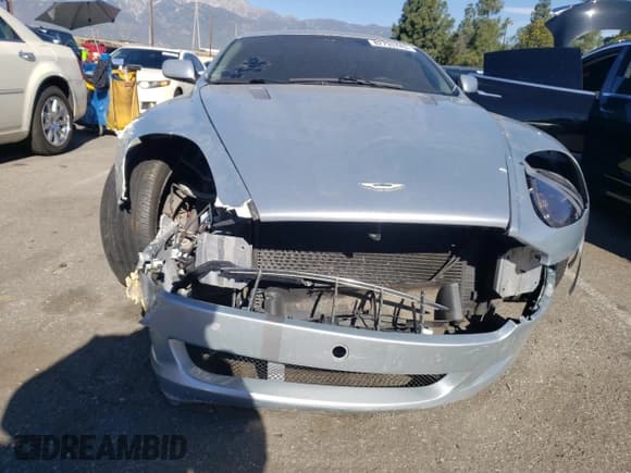 ✅ 2007 Aston Martin DB9 • VIN: SCFAB01A37GA08055 • Lot: 82733743. Wystawiony na Copart z przebiegiem 39 201 mil. Bezpłatny archiwum sprzedaży aukcyjnych z USA i szczegółowy raport historii pojazdu na DreamBid. Zdjęcie 5.