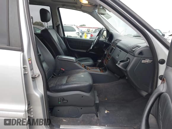 ✅ 2001 Mercedes-Benz M 320/430/500 • VIN: 4JGAB54E71A231597 • Lot: 42058829. Listed on IAAI with 233,005 mi. Free auction sales archive from the USA and detailed vehicle history report at DreamBid. Image 5.