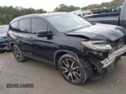 ✅ 2019 Honda Pilot Touring 8-Passenger • VIN: 5FNYF5H96KB037544 • Лот: 43526396. Опубликован ранее на IAAI с пробегом 143 482 миль. Бесплатный доступ к архиву аукционных продаж из США и подробный отчёт об истории автомобиля на DreamBid. Изображение 13.