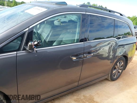 ✅ 2015 Honda Odyssey Touring Elite • VIN: 5FNRL5H97FB060981 • Lot: 42289631. Listed on IAAI with 160,947 mi. Free auction sales archive from the USA and detailed vehicle history report at DreamBid. Image 14.