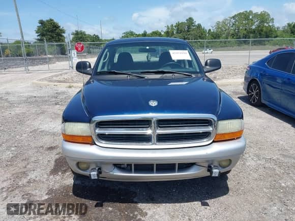 2003 Dodge Dakota SLT with VIN 1D7HL42N83S256346, listed as a IAAI auction lot 42454110 with 75,961 mi miles and . Bid and sale history available at DreamBid. Image 12.