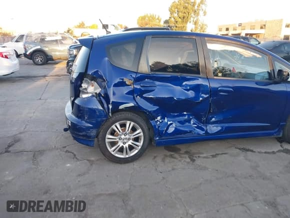✅ 2009 Honda Fit Sport • VIN: JHMGE88489S037061 • Lot: 43812358. Listed on IAAI with 192,661 mi. Free auction sales archive from the USA and detailed vehicle history report at DreamBid. Image 6.
