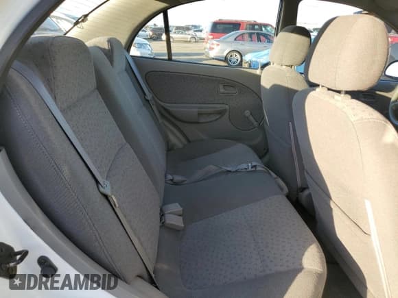 ✅ 2005 Kia Rio • VIN: KNADC125656373469 • Lot: 78943144. Listed on Copart with 88,398 mi. Free auction sales archive from the USA and detailed vehicle history report at DreamBid. Image 10.