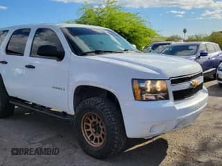 ✅ 2009 Chevrolet Tahoe Commercial • VIN: 1GNFK130X9R208604 • Lot: 42139426. Wystawiony na IAAI z przebiegiem 143 045 mil. Bezpłatny archiwum sprzedaży aukcyjnych z USA i szczegółowy raport historii pojazdu na DreamBid. Zdjęcie 1.