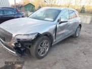 ✅ 2023 Genesis GV70 2.5T • VIN: KMUMADTB6PU130349 • Lot: 43700475. Listed on IAAI with 31,124 mi. Free auction sales archive from the USA and detailed vehicle history report at DreamBid. Image 2.