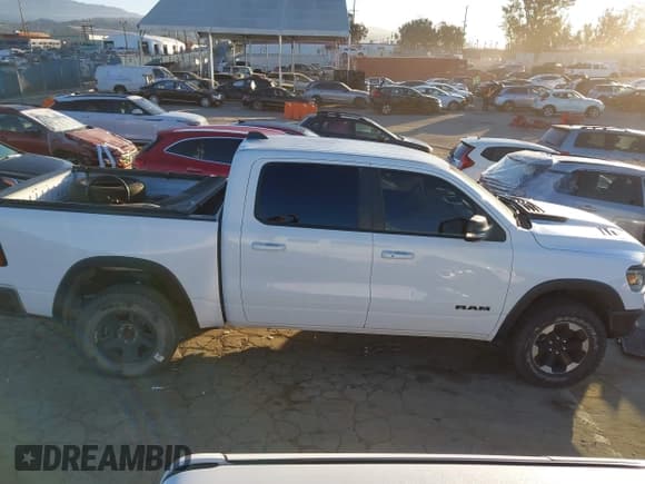 ✅ 2022 Ram 1500 Rebel • VIN: 1C6SRFLT4NN282636 • Лот: 43881798. Опубликован ранее на IAAI с пробегом 38 884 миль. Бесплатный доступ к архиву аукционных продаж из США и подробный отчёт об истории автомобиля на DreamBid. Изображение 14.