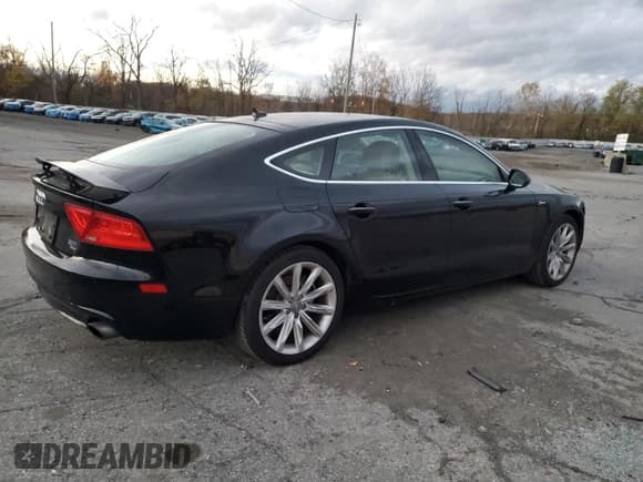 ✅ 2014 Audi A7 Premium Plus • VIN: WAUWGAFC0EN030877 • Lot: 82308305. Listed on Copart with 60,786 mi. Free auction sales archive from the USA and detailed vehicle history report at DreamBid. Image 3.
