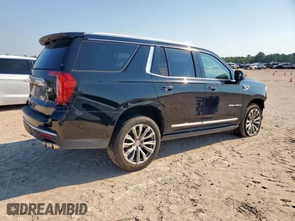 ✅ 2021 GMC Yukon Denali • VIN: 1GKS1DKL2MR365841 • Lot: 71232065. Listed on Copart with 67,549 mi. Free auction sales archive from the USA and detailed vehicle history report at DreamBid. Image 3.