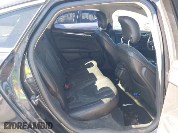 ✅ 2013 Ford Fusion Titanium Hybrid • VIN: 3FA6P0RU6DR344598 • Лот: 43531118. Опубликован ранее на IAAI с пробегом 354 745 миль. Бесплатный доступ к архиву аукционных продаж из США и подробный отчёт об истории автомобиля на DreamBid. Изображение 8.