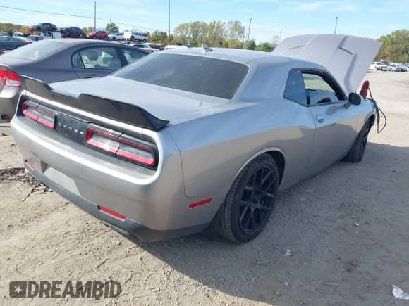 2016 Dodge Challenger R/T Plus Shaker z VIN 2C3CDZBTXGH278458, wystawiony jako IAAI lot #43462588 z przebiegiem 77 937 mil mil oraz . Historia ofert i sprzedaży dostępna na DreamBid. Obrazek 4.