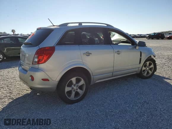 2014 Chevrolet Captiva Sport LT с VIN 3GNAL3EK2ES677159, выставлен на аукционе Copart как лот 77406904 с пробегом Не указан миль и Списание • Salvage title. История ставок и продаж доступна на DreamBid. Изображение 3.