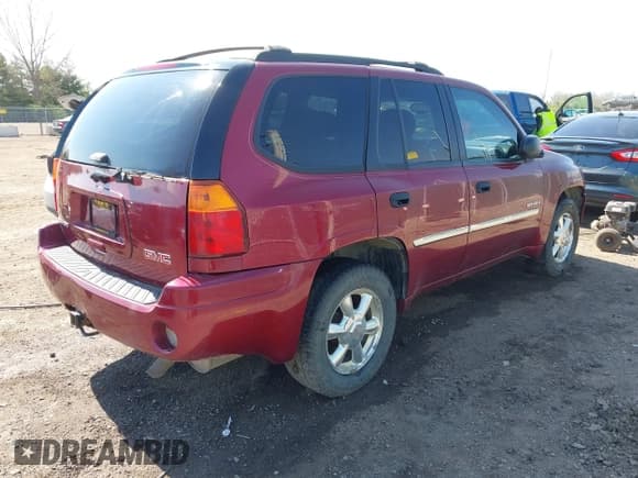 ✅ 2006 GMC Envoy SLT • VIN: 1GKDT13S662189377 • Lot: 42106602. Listed on IAAI with 156,391 mi. Free auction sales archive from the USA and detailed vehicle history report at DreamBid. Image 4.