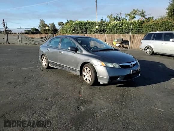 ✅ 2011 Honda Civic LX • VIN: 2HGFA1F50BH300900 • Лот: 80694535. Опубликован ранее на Copart с пробегом 69 990 миль. Бесплатный доступ к архиву аукционных продаж из США и подробный отчёт об истории автомобиля на DreamBid. Изображение 13.