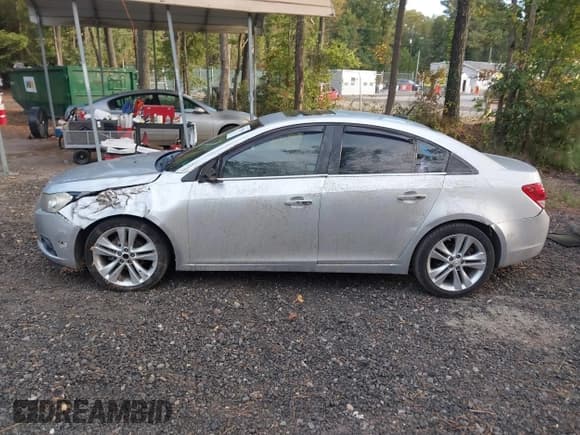 ✅ 2011 Chevrolet Cruze LTZ • VIN: 1G1PH5S94B7194213 • Лот: 43387084. Опубликован ранее на IAAI с пробегом 142 321 миль. Бесплатный доступ к архиву аукционных продаж из США и подробный отчёт об истории автомобиля на DreamBid. Изображение 14.