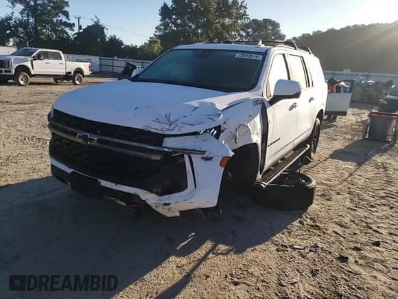 ✅ 2022 Chevrolet Suburban Z71 • VIN: 1GNSKDKDXNR212456 • Lot: 73913514. Wystawiony na Copart z przebiegiem 71 389 mil. Bezpłatny archiwum sprzedaży aukcyjnych z USA i szczegółowy raport historii pojazdu na DreamBid. Zdjęcie 12.