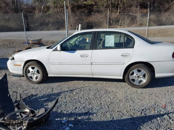 2002 Chevrolet Malibu LS z VIN 1G1NE52JX2M650369, wystawiony jako IAAI lot #41348110 z przebiegiem Nie podano mil oraz . Historia ofert i sprzedaży dostępna na DreamBid. Obrazek 14.