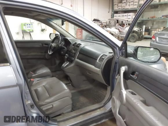 ✅ 2007 Honda CR-V EX-L • VIN: JHLRE48777C062721 • Lot: 43666509. Wystawiony na IAAI z przebiegiem 292 284 mil. Bezpłatny archiwum sprzedaży aukcyjnych z USA i szczegółowy raport historii pojazdu na DreamBid. Zdjęcie 5.