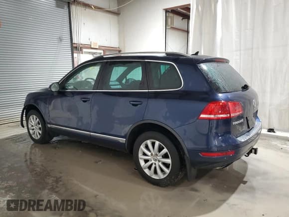 ✅ 2012 Volkswagen Touareg Lux • VIN: WVGEF9BP1CD010287 • Лот: 71975045. Опубликован ранее на Copart с пробегом 130 238 миль. Бесплатный доступ к архиву аукционных продаж из США и подробный отчёт об истории автомобиля на DreamBid. Изображение 2.