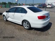 ✅ 2014 Volkswagen Jetta TDI w/Premium/Nav • VIN: 3VWLL7AJXEM366828 • Lot: 42392563. Listed on IAAI with 132,924 mi. Free auction sales archive from the USA and detailed vehicle history report at DreamBid. Image 3.