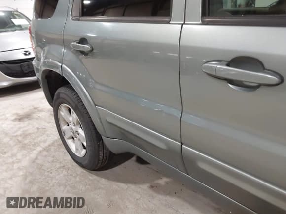 ✅ 2006 Ford Escape Limited • VIN: 1FMCU94126KA37083 • Lot: 43700533. Wystawiony na IAAI z przebiegiem 231 636 mil. Bezpłatny archiwum sprzedaży aukcyjnych z USA i szczegółowy raport historii pojazdu na DreamBid. Zdjęcie 13.